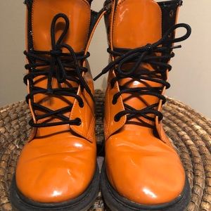 Orange lace up boots